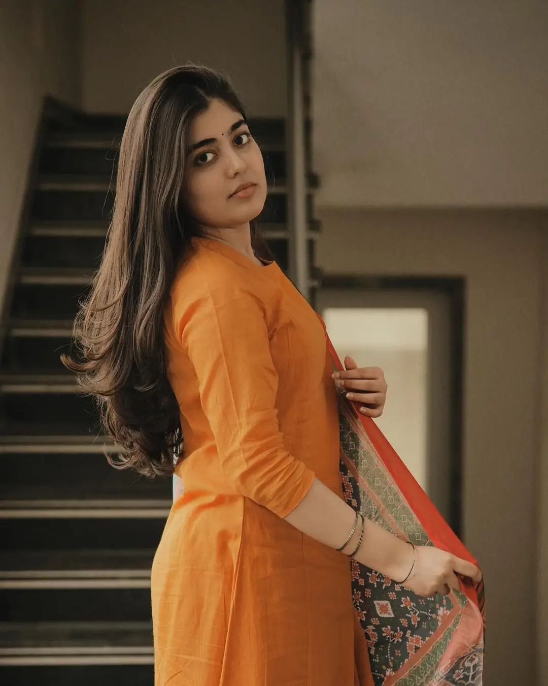 GARGEYI YELLAPRAGADA STILLS IN ORANGE DRESS